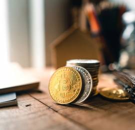 bitcoin-coins-on-a-wooden-desk-at-home-2023-11-27-05-16-26-utc.jpg